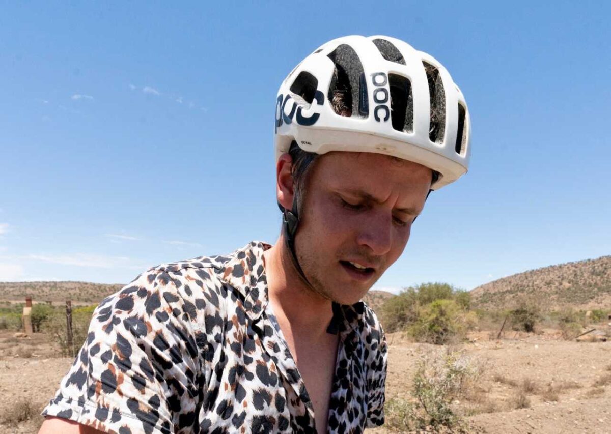 chasing-the-sun-gravel-bike-bike-market-1280x910 tired gravel rider with poc helmet